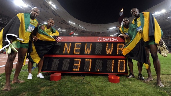 Sprinter Michael Frater (second from left) with Usain Bolt and Jamaica team mates