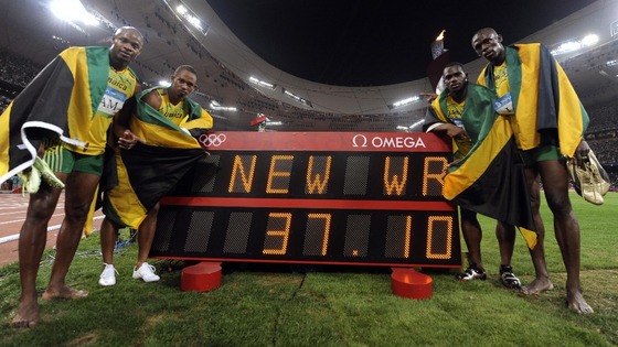 Sprinter Michael Frater (second from left) with Usain Bolt and Jamaica team mates