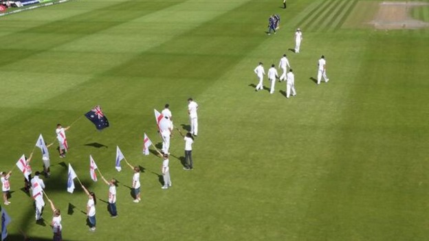 England cricketers walk onto the pitch at Old Trafford in Manchester