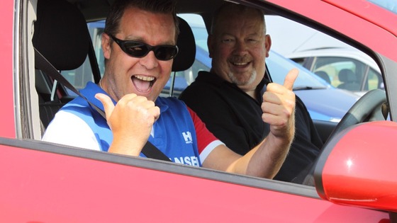 blind man enjoys driving lesson