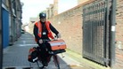 TNT postman on a cycle
