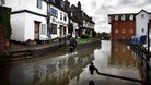 Floodwaters rise around Mill Street, Tewkesbury, as much of England and Wales braced for flooding