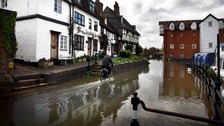 Floodwaters rise around Mill Street, Tewkesbury, as much of England and Wales braced for flooding