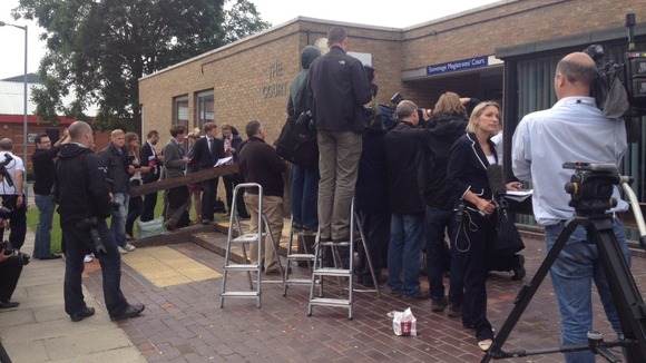 Media gather outside Stevenage Magistrates Court