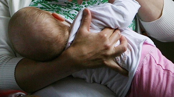 woman breast feeding