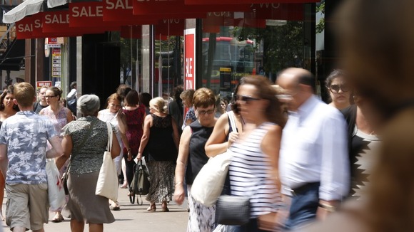 Shoppers in central London during the warm weather