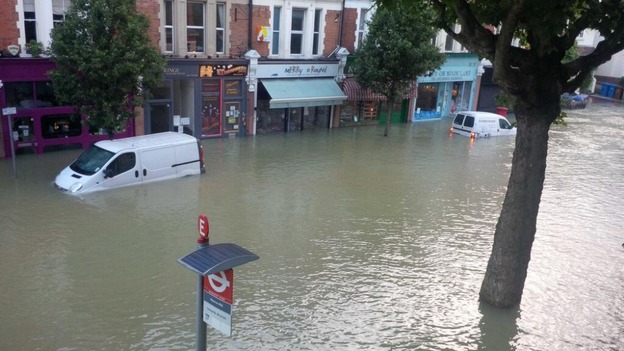Van left submerged after the floods in Herne Hill
