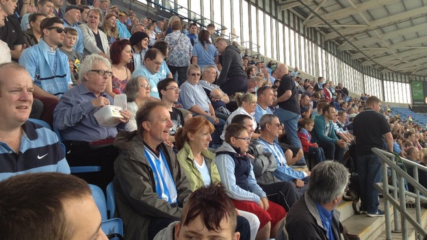 Football fans fill the stands at the Ricoh Arena for legends match