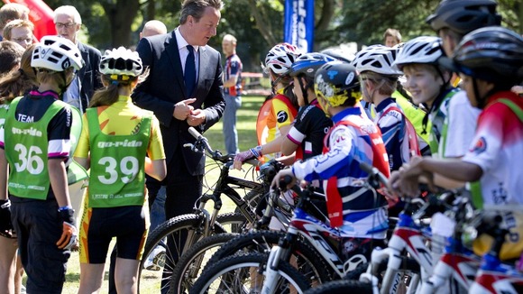 David Cameron speaks to children involved in a 'Go Ride' cycling event in Watford