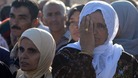 Palestinian families wait to receive the news of whether their loved ones will be freed
