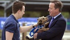 David Cameron holds Bertie - but not for long.
