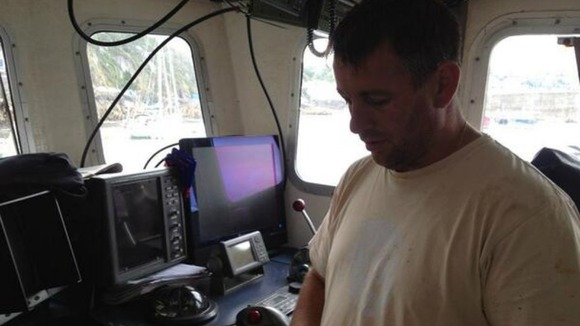 David Warwick, the tweeting fisherman, in the pilot's cabin