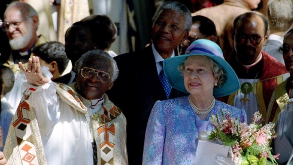Queen Elizabeth II leaving St Georges Cathedral, accompanied by Archbishop Desmond Tutu and President Nelson Mandela