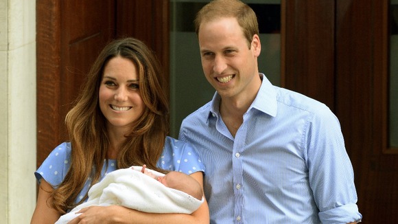 Duchess and Duke of Cambridge leave the Lido wing with their new son Prince George