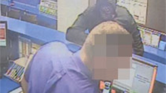 CCTV image of masked robber at Coral bookmakers, High Street, Chesterton, Cambridge.
