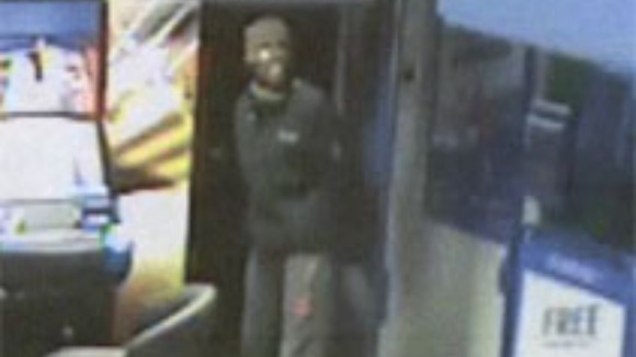 CCTV image of an armed robbery at Coral bookmakers, High Street, Chesterton, Cambridge.