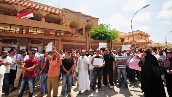 Supporters of the ousted president Mohamed Morsi outside the Egyptian consulate in Beghazi on Thursday