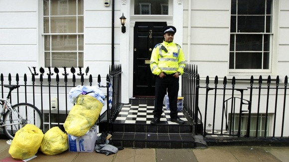 Police guard Gareth Williams' Pimlico flat in London.