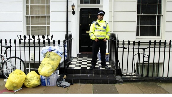 Police guard Gareth Williams' Pimlico flat in London.