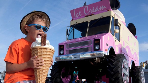 Leighton, eight, from Norfolk enjoys a free ice cream from a giant ice cream van.