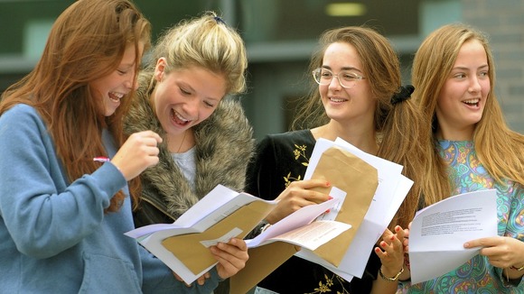 Two sets of twins - Minnie Crawley, Tallulah Crawley, Florence Hislop and Dorothy Hislop open their GCSE results.