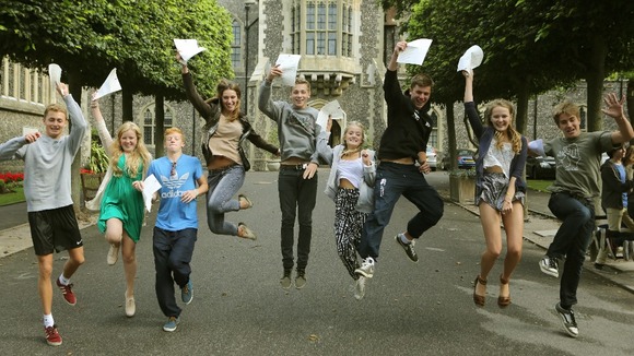 Students at Brighton College in East Sussex, celebrate their GCSE results.