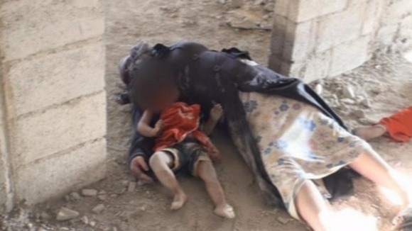 A dead woman and child are seen in footage shot in Zamalka, that was obtained by ITV News