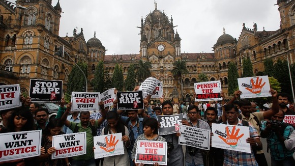 ournalists hold placards as they participate in a protest march in Mumbai.