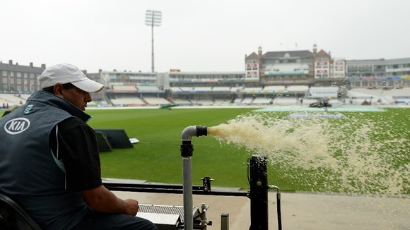 Water is pumped off the outfield