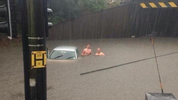 Men up to their chests in water