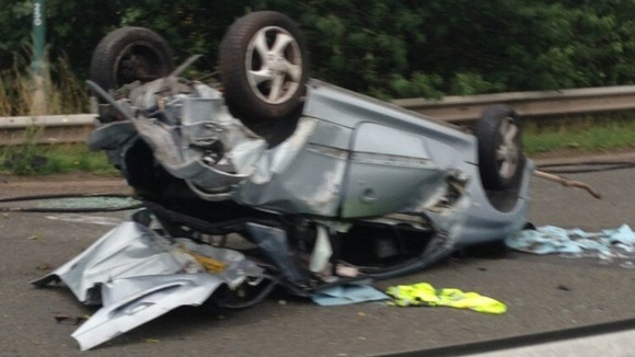 Two women were travelling in this car when it crashed with two others and ended up on its roof
