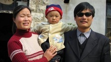 Chen Guangcheng with his wife and one of their children. 