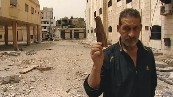 Rebel soldiers say they are being fired on by heavy artillery.
