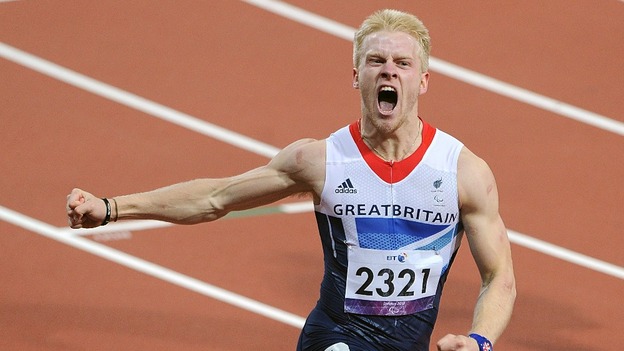 Great Britain's Jonnie Peacock celebrates as he crosses the line to win the Men's 100m - T44 Final, during the Paralympic Games in London.