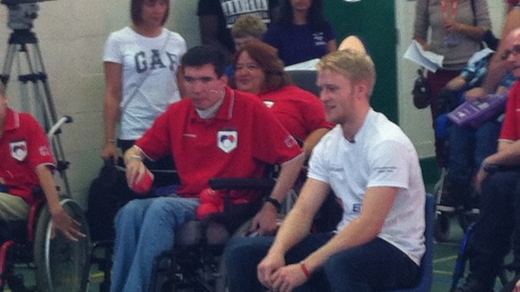 Paralympic sprinter Jonnie Peacock having a game of Boccia at Impington College, Cambridge.