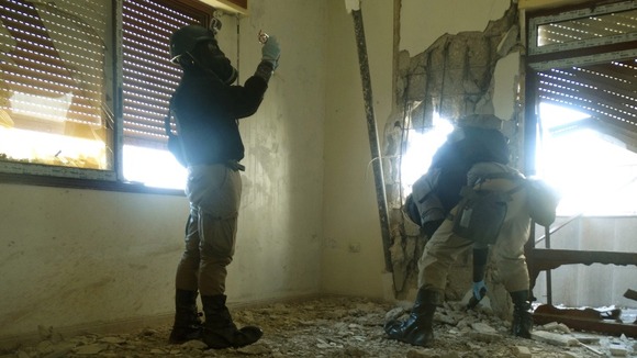 UN chemical weapons experts inspect the site of an alleged chemical weapons attack.
