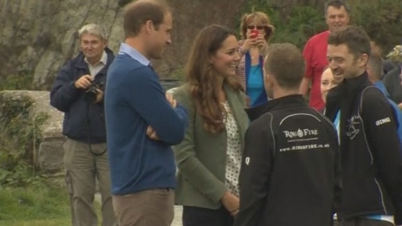William and Kate meet some of the marathon runners ahead of the race.