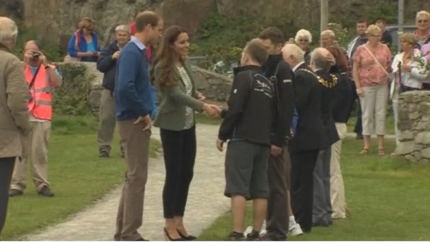 William and Kate meet some of the marathon runners ahead of the race.
