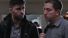 David Miranda with journalist Glenn Greenwald at an airport in Brazil.