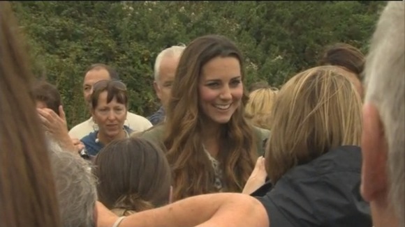 The Duchess of Cambridge smiles as she chat to locals.