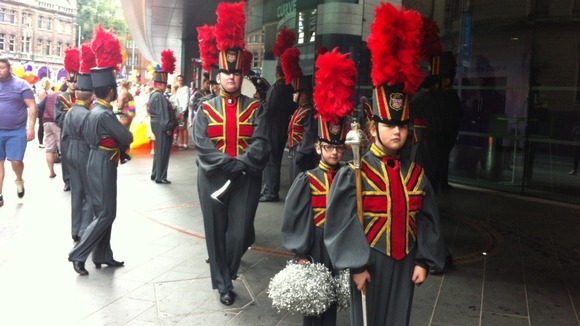Some of the people parading through the city centre