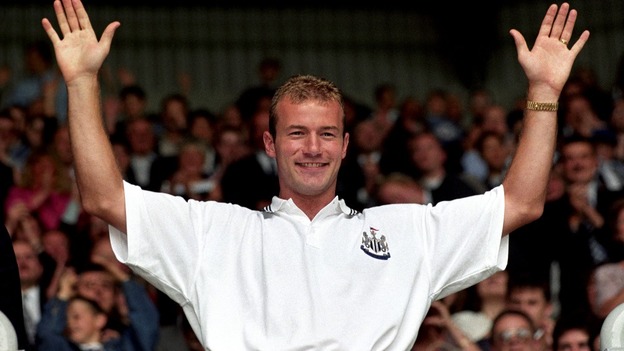 Al an Shearer dons a Newcastle United shirt after is record-breaking £15m transfer from Blackburn Rovers
