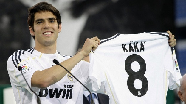 Brazilian footballer Kaka holds his new Real Madrid jersey in 2009
