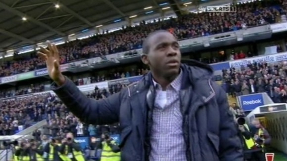 Muamba waves to the crowd