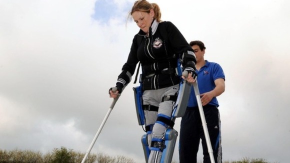 Claire Lomas is the first to walk the London marathon course in a bionic suit. She will not receive a medal when she finishes.