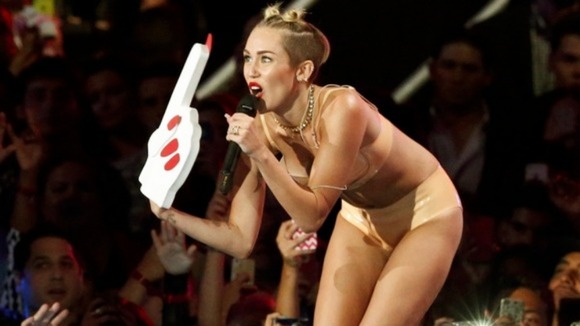 Miley Cyrus twerks during her performance with Robin Thicke at the VMA Awards.