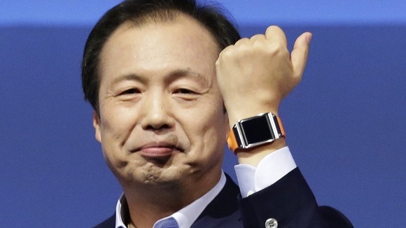 Shin Jong-kyun, President and CEO, head of IT and Mobile Communication division of Samsung presents the Galaxy Gear smart watch.