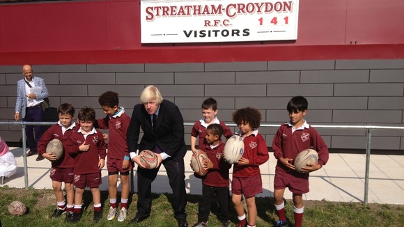The Mayor is inspecting the new spectator stand and changing rooms