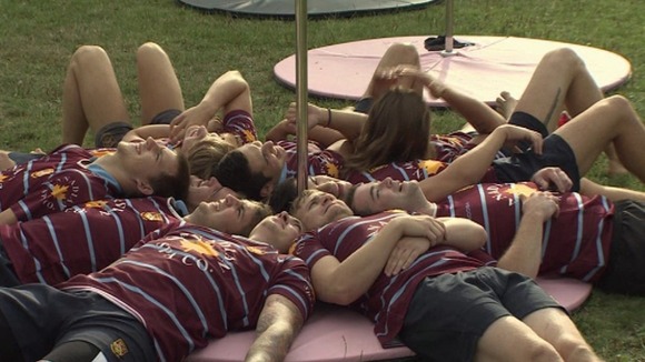 Rugby players in Crawley being taught to pole dance