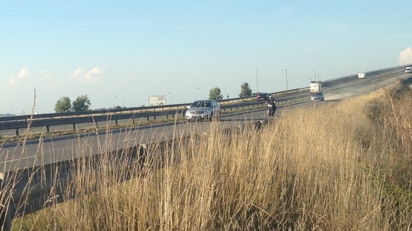 The first cars cross the New Sheppey Crossing bridge in Kent.